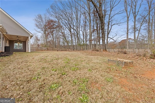 view of yard featuring ceiling fan