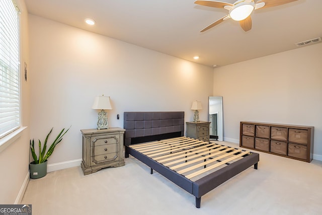 carpeted bedroom featuring ceiling fan