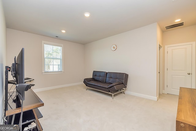 sitting room with light carpet