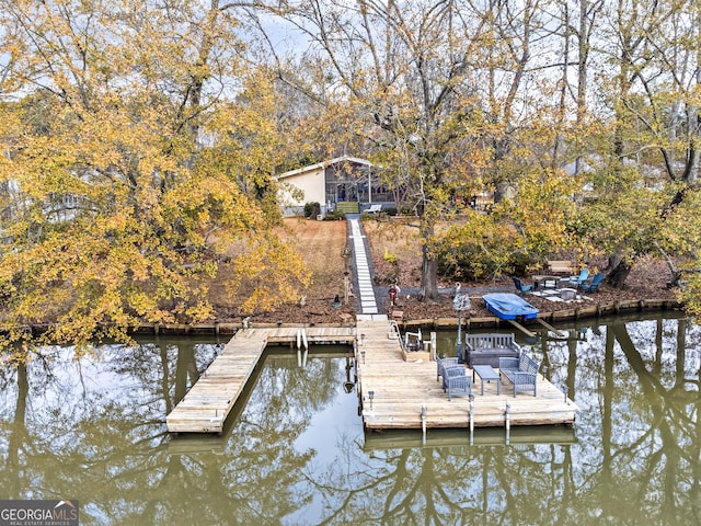 view of dock with a water view