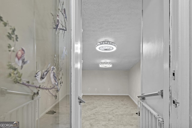 bathroom featuring a textured ceiling