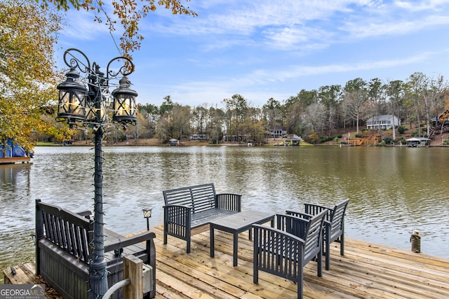 dock area featuring a water view