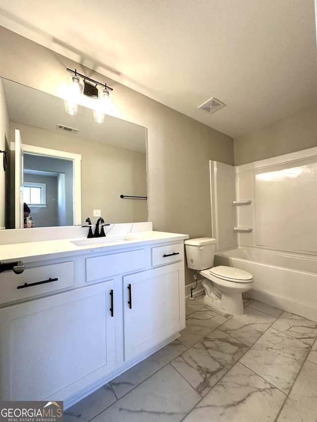 full bath with marble finish floor, visible vents, vanity, and toilet