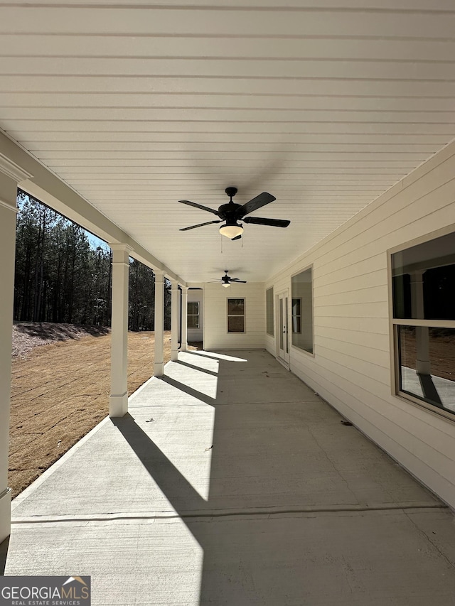 view of patio featuring ceiling fan