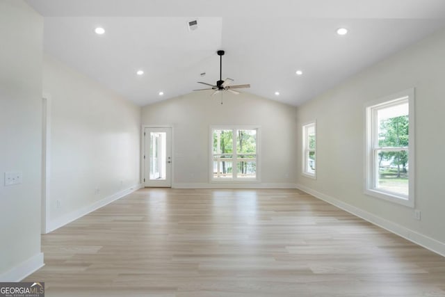 unfurnished living room with light wood-type flooring, high vaulted ceiling, and ceiling fan