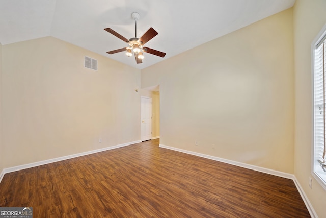 unfurnished room featuring hardwood / wood-style floors, ceiling fan, and vaulted ceiling