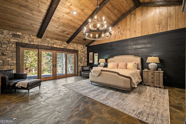 bedroom with wood walls, beam ceiling, wooden ceiling, and french doors