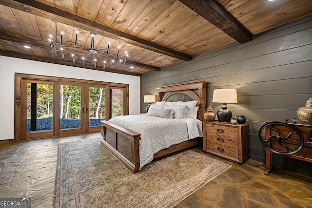 bedroom with french doors, access to outside, wooden ceiling, and wood walls