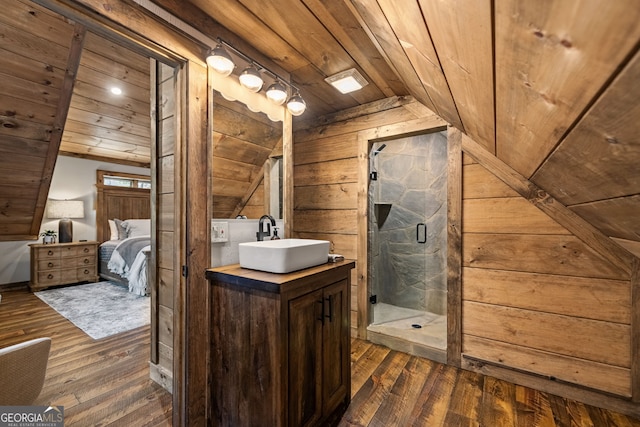 bathroom with wooden ceiling, walk in shower, lofted ceiling, vanity, and hardwood / wood-style flooring