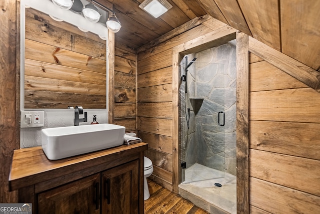 bathroom featuring wood walls, hardwood / wood-style floors, wooden ceiling, and an enclosed shower