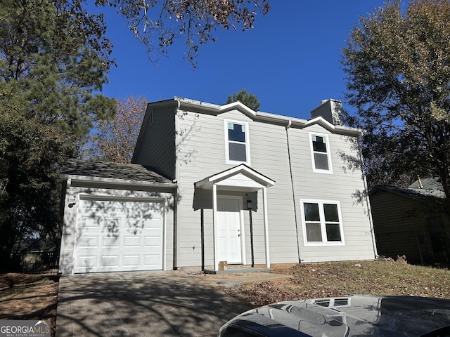 front of property featuring a garage