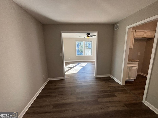 hallway featuring dark hardwood / wood-style floors