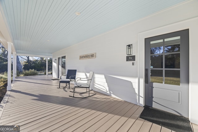 wooden terrace with covered porch