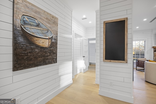 hallway featuring light hardwood / wood-style floors