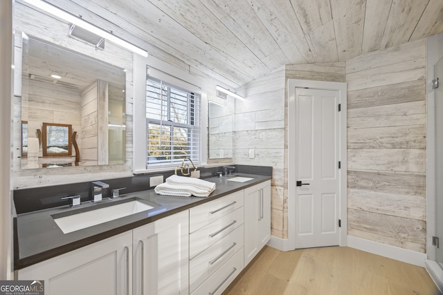 bathroom with wood ceiling, vanity, wooden walls, wood-type flooring, and lofted ceiling