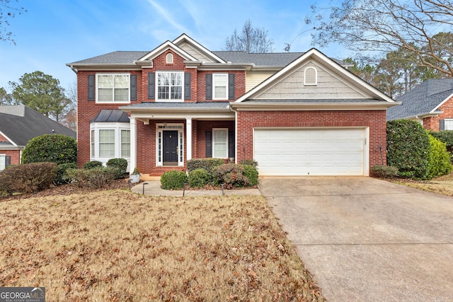 view of front of home with a garage