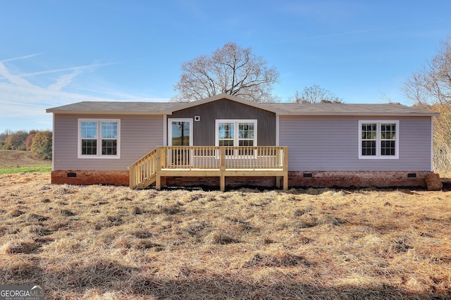 view of front of home with a deck