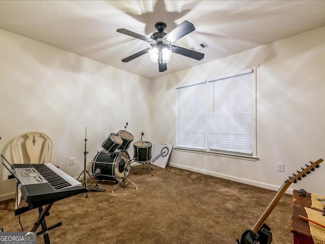 miscellaneous room featuring carpet and ceiling fan