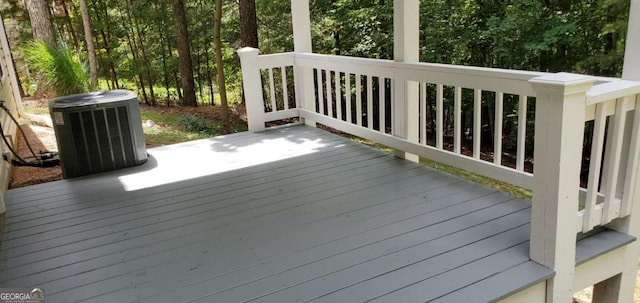 wooden deck with central AC unit