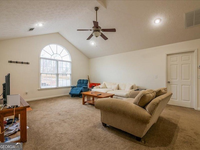 living room with carpet flooring, ceiling fan, a textured ceiling, and vaulted ceiling