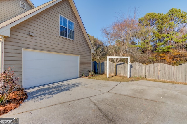 view of home's exterior with a garage