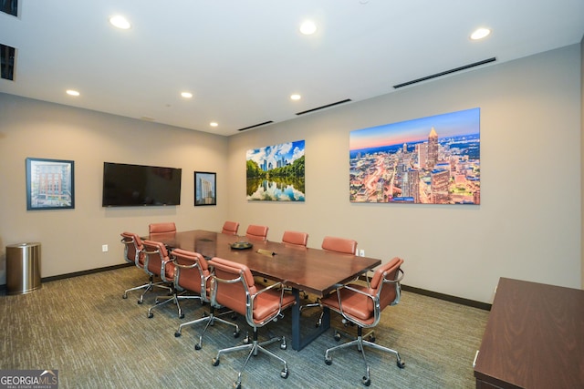 view of carpeted dining space