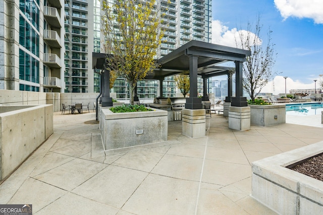 view of patio / terrace with a community pool