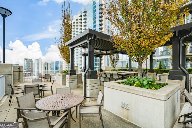 view of patio / terrace with an outdoor bar