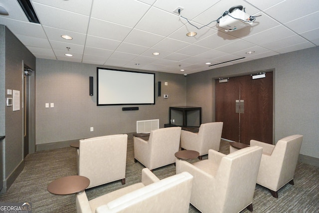 home theater room featuring carpet