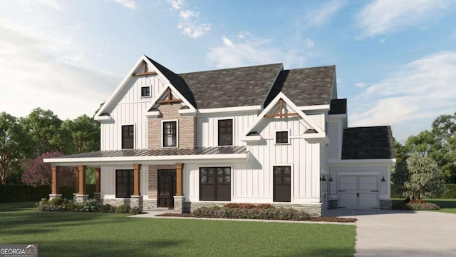 view of front of house with a front lawn, a porch, and a garage