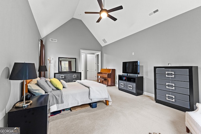 carpeted bedroom featuring ceiling fan and high vaulted ceiling