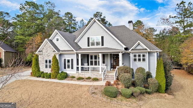 craftsman inspired home featuring a porch