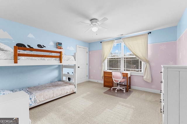 bedroom with ceiling fan and light colored carpet