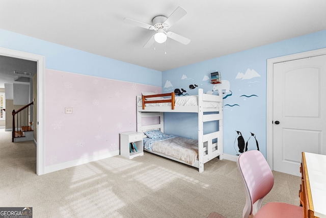 carpeted bedroom featuring ceiling fan