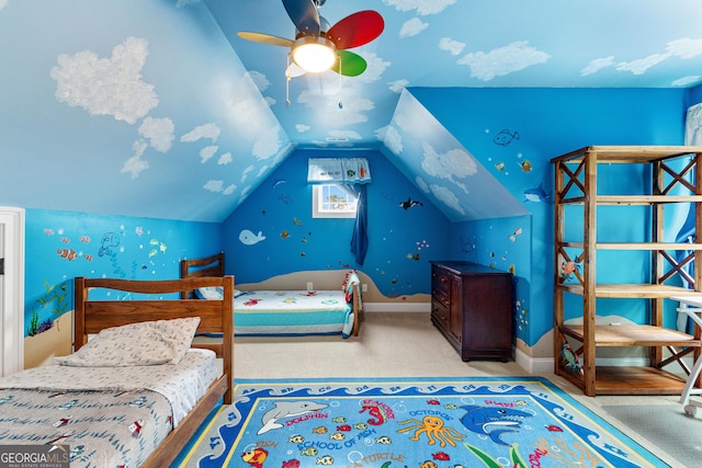 carpeted bedroom with ceiling fan and vaulted ceiling