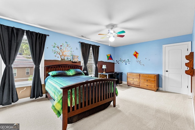 bedroom with carpet flooring and ceiling fan