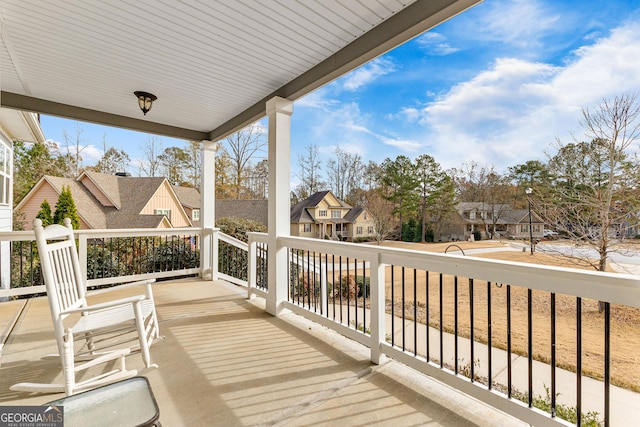 wooden deck with a porch