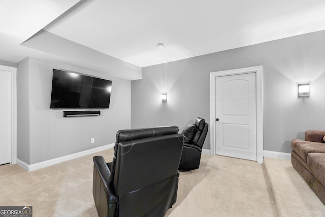 home theater with light colored carpet