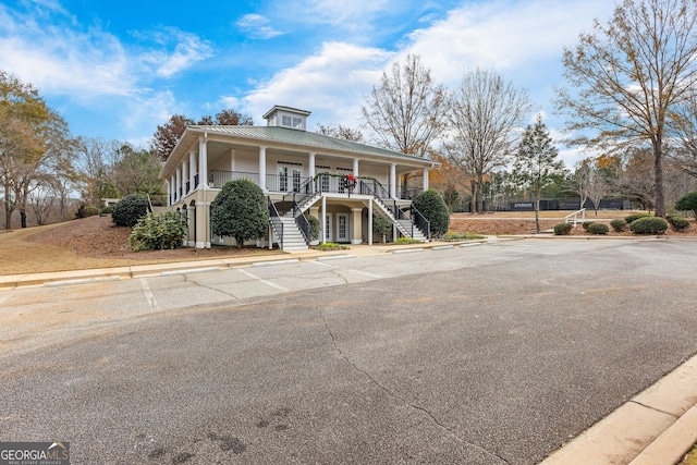 view of front of home featuring covered porch