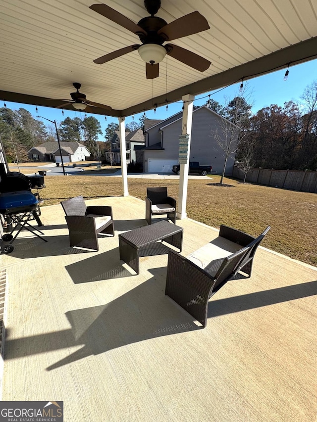 view of patio with ceiling fan