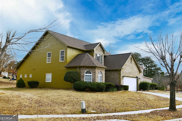 view of home's exterior featuring a garage