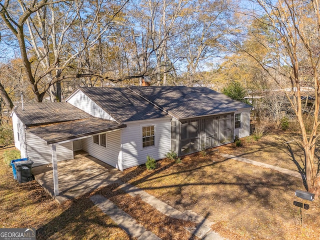 view of side of property featuring a garage