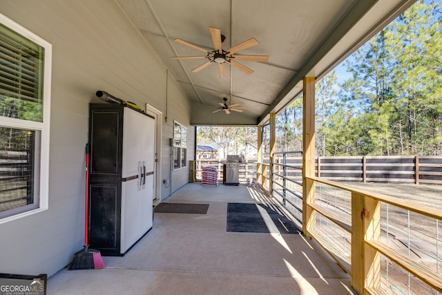 view of patio / terrace featuring a grill and ceiling fan