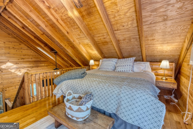 bedroom with wood ceiling, wood walls, lofted ceiling with beams, and wood-type flooring