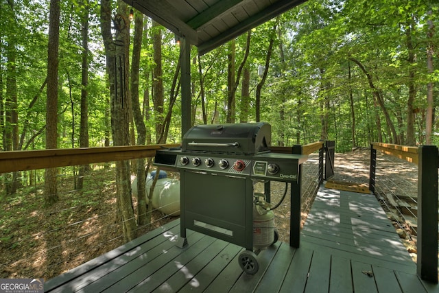 wooden deck with grilling area