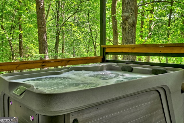 exterior space featuring a hot tub