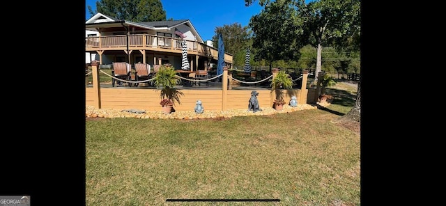 view of yard with a wooden deck