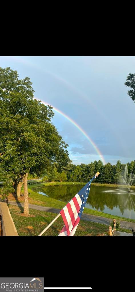 view of property's community featuring a water view