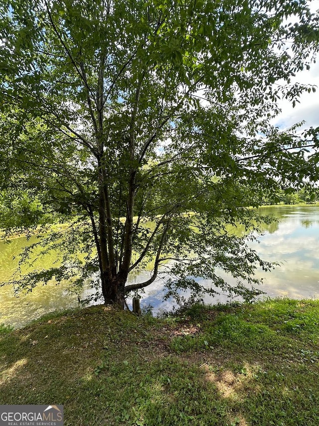 exterior space with a water view