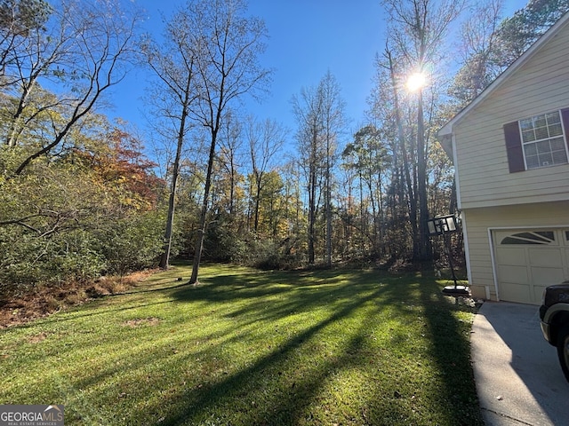 view of yard featuring a garage